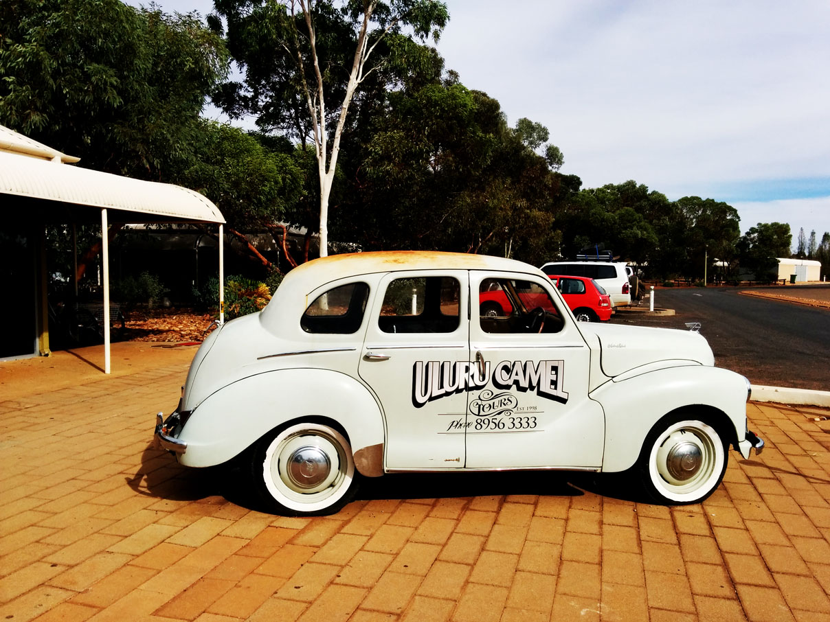 Old tour car just outside the Outback Pioneer Hotel