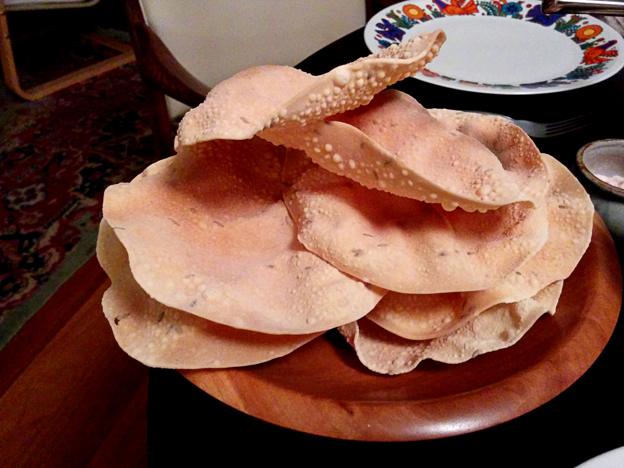 Delicious dinner with crispy papadums