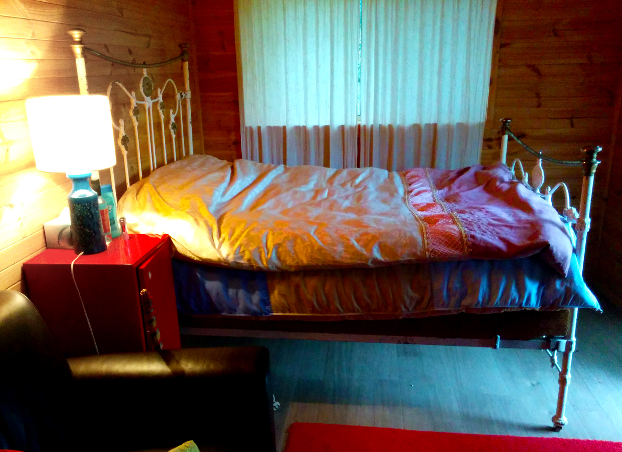 My princess bed :) It's where I discovered the magic of the hot water bottle, shoved at the foot of the doona that was tucked in hotel-bed-like, and my feet on top of it. Toasty warm on chilly nights :)