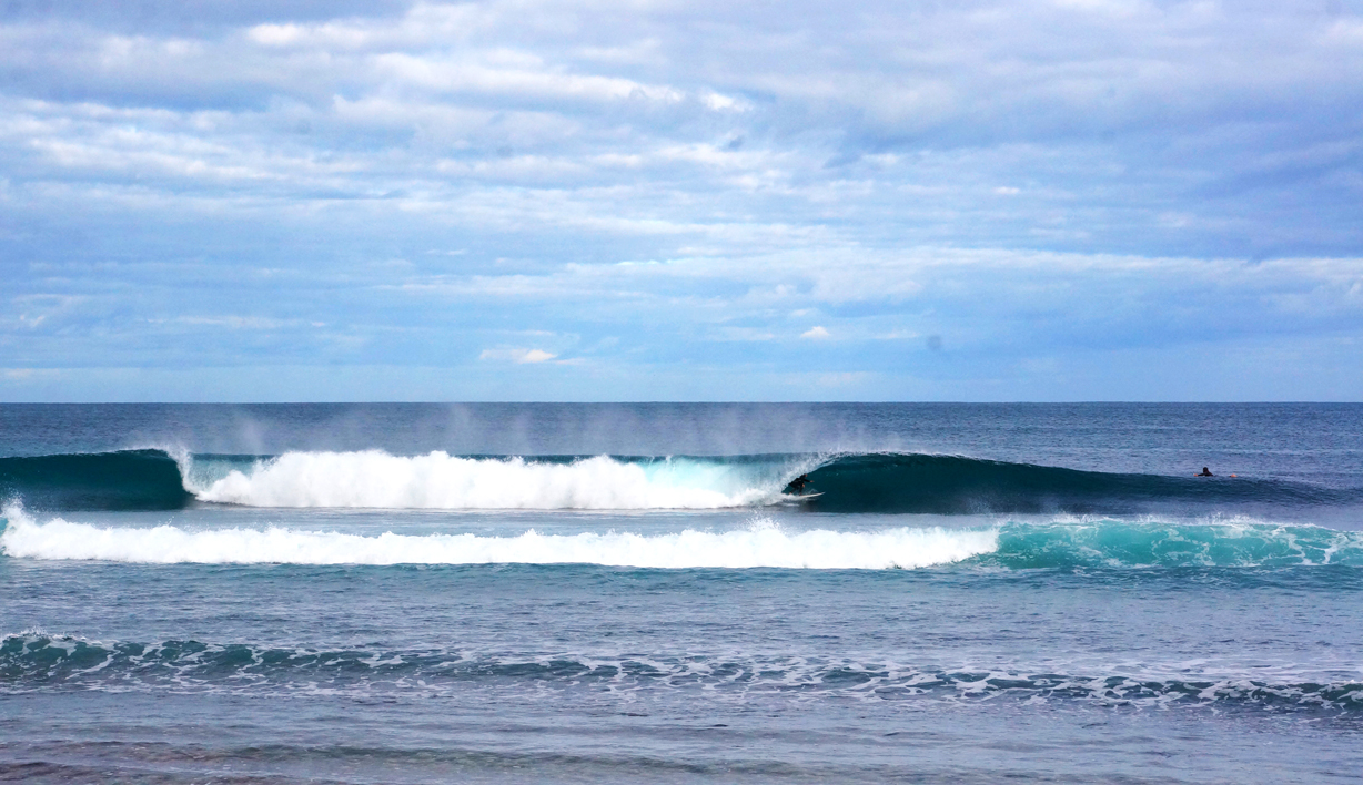 Surfers on the water